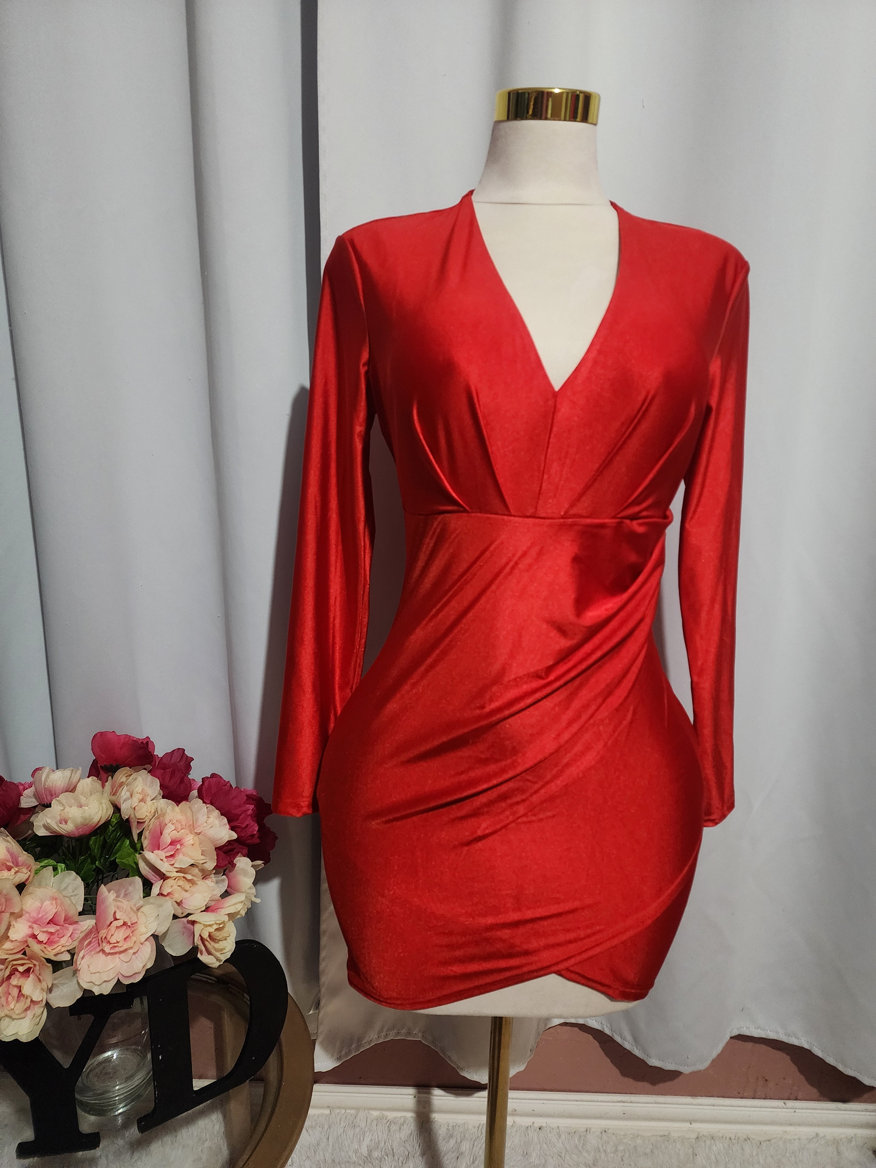 Red long-sleeved dress with V-neckline