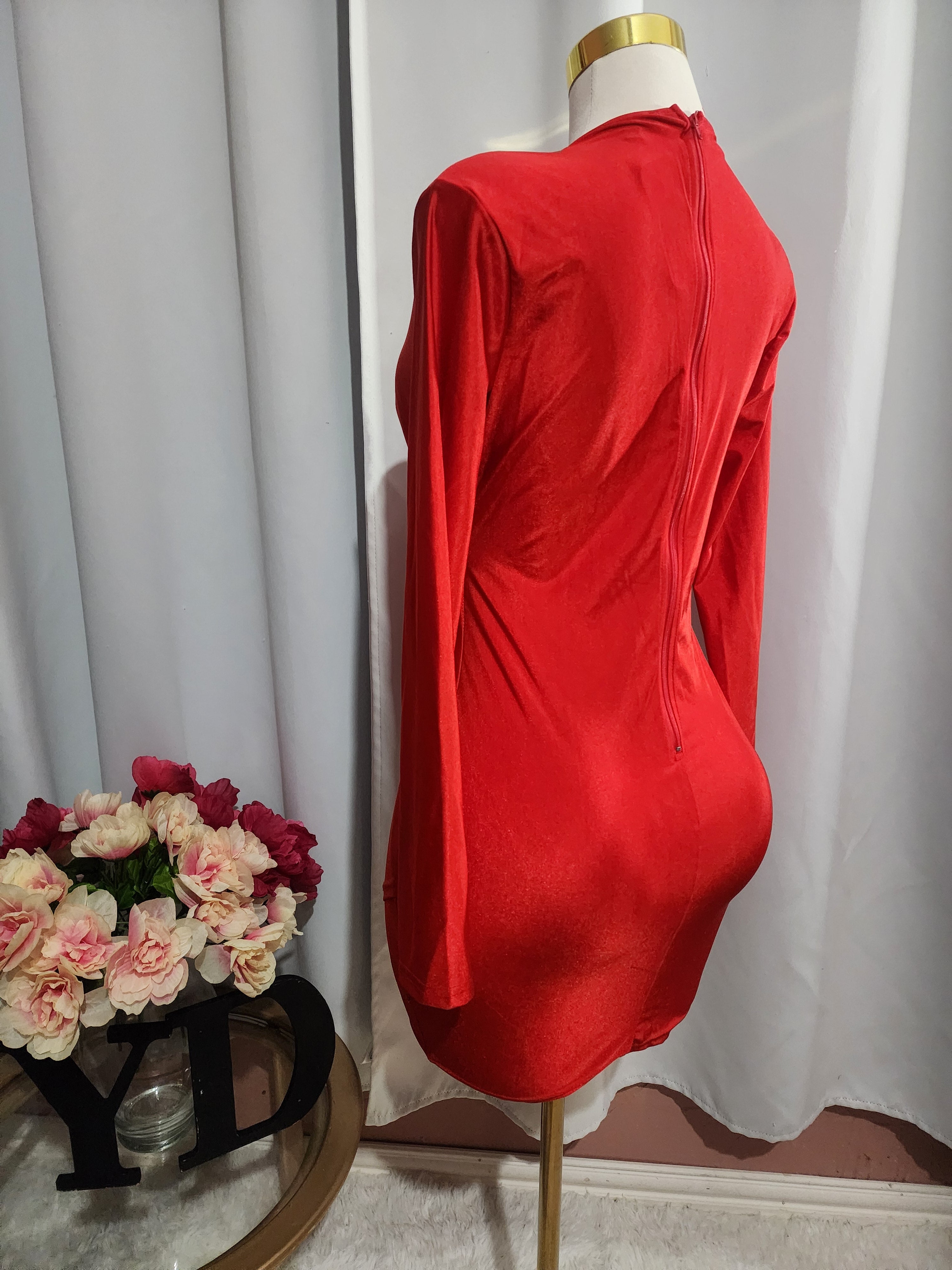 Red long-sleeved dress with V-neckline