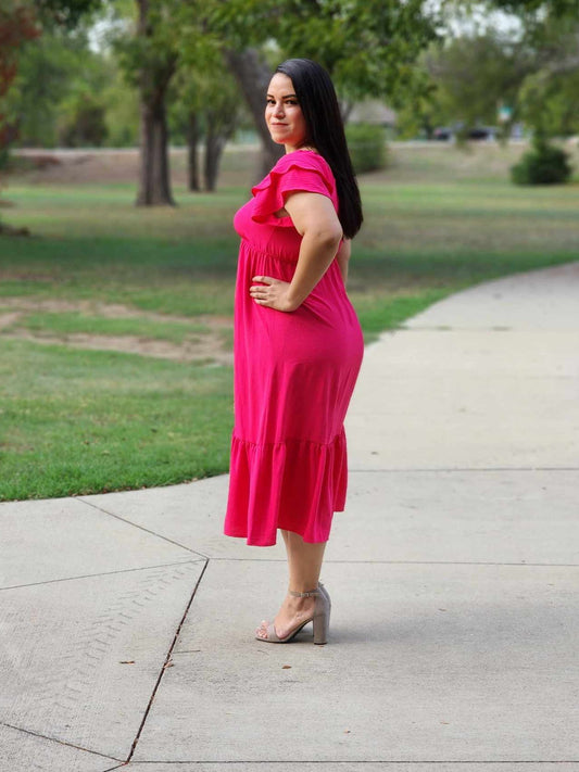 Vestido midi fucsia con cuello en V